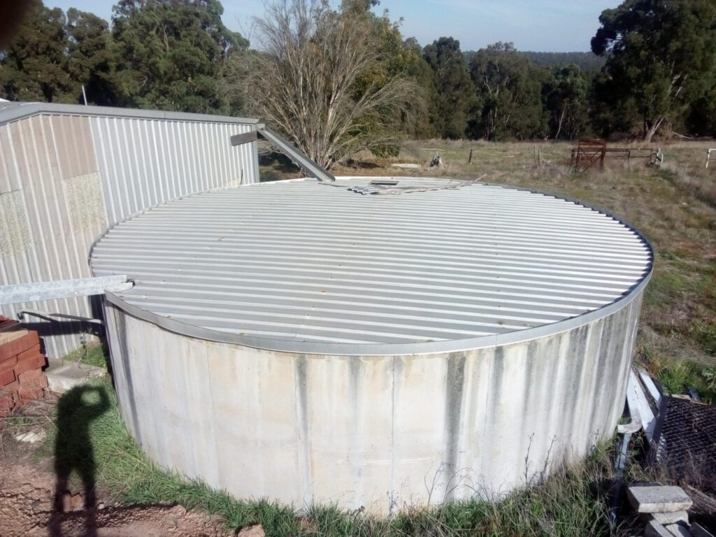 Concrete-Tank-Roof-Install-Beside-Shed-2048x1536